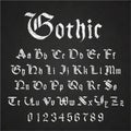 Old hand drawn gothic letters drawing with white chalk on black chalkboard Royalty Free Stock Photo
