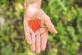 Old hand grandmother hold heart. Concept idea of love family protecting elderly people grandmother friendship togetherness