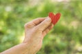 Old hand grandmother hold heart. Concept idea of love family protecting elderly people grandmother friendship togetherness