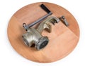 Old hand meat grinder on the wooden serving board Royalty Free Stock Photo