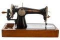 An old, hand sewing machine on white background Royalty Free Stock Photo