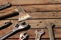 Old hand tool on a wooden surface. Tools for repair and construction Royalty Free Stock Photo