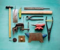 Old hand tools for metalsmith craft, flat lay