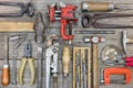 Old hand tools set including clamps, hammer, screwdriver, wrench Royalty Free Stock Photo