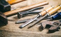 Old hand tools on wooden background Royalty Free Stock Photo