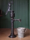 Old Hand Water with a Bucked Royalty Free Stock Photo