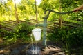 Old hand water pump outside in the garden Royalty Free Stock Photo