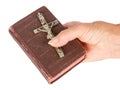 Old hand (woman) holding a very old bible Royalty Free Stock Photo