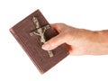 Old hand (woman) holding a very old bible Royalty Free Stock Photo