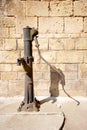 An old hand worked water pump in Greece