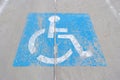 Old handicapped parking sign painted on concrete Royalty Free Stock Photo