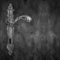 Old handle on black plate background Royalty Free Stock Photo