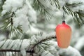 Old handmade Christmas ornament in the winter forest