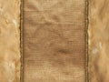 Old handmade paper sheet on fabric background Royalty Free Stock Photo