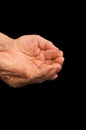 Old hands begging on the black Royalty Free Stock Photo