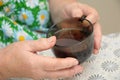 Old Hands Holding A cap of tea Royalty Free Stock Photo