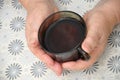 Old Hands Holding cap of tea Royalty Free Stock Photo