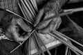 Old hands making wicker objects II Royalty Free Stock Photo
