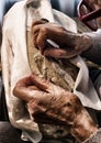 Elder hands working on textile Royalty Free Stock Photo