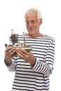 Old sailor happy with model boat Royalty Free Stock Photo