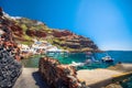 The old harbor of Ammoudi under the famous village of Ia at Santorini Royalty Free Stock Photo