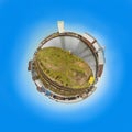 Old harbor in Dortmund as tiny planet with old dock buildings and rotten painted walls