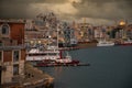 Harbour of Genoa Genova by sunset, Italy. View of the old port with a cloudy sky