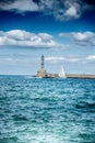 Old harbor, lighthouse, sailboat, Chania, Crete, Greece