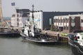 The old harbor with tugboat from Maassluis near Rotterdam port