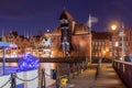 Harbour crane and city gate Zuraw, Gdansk, Poland Royalty Free Stock Photo