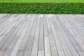 Old hardwood decking or flooring and plant in garden decorative