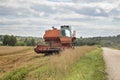 Old harvester on the field Royalty Free Stock Photo