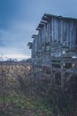 Old haunted house on the empty field Royalty Free Stock Photo