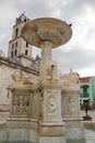 Old Havana, Cuba: Fountain with lions and San Francisco church