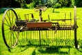Old hay turning machine Royalty Free Stock Photo