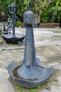 Old heavy anchor with curved doors