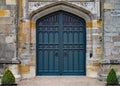 Old heavy ornate door in an old English manor house