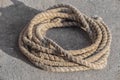 Old hemp rope coiled in a circle Royalty Free Stock Photo