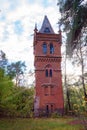 Old high brick water tower in the Gothic style in the estate Natalyevka, Kharkiv region, Ukraine Royalty Free Stock Photo