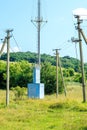 Old high voltage transformer and power line Royalty Free Stock Photo