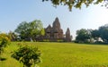 Old Hindu temple, built by Chandela Rajputs, at Western site in India`s Khajuraho framed by trees. Royalty Free Stock Photo