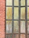 Old steel doors in a brick wall Royalty Free Stock Photo