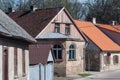 Old historic buildings in sunny spring day, Kuldiga old town, Latvia Royalty Free Stock Photo