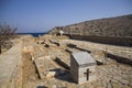 Old historic cemetery under the Spinalonga fortress. Greek ancient cemetery on the island. Chapel and burial place of the dead Royalty Free Stock Photo