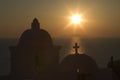 Old historic chapel by the sea with sunset in the background in Santorini, Greece Royalty Free Stock Photo