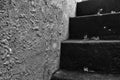 Old historic dungeon or basement stairs, abandoned stairs close-up background black and white Royalty Free Stock Photo