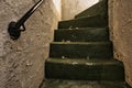 Old historic dungeon or basement stairs, abandoned stairs close-up background Royalty Free Stock Photo