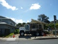 Old historic home from the 1930's is cut in half put on trailer