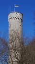 Old historic massive tower in Tallinn (Estonia) with flag