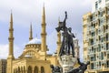Monument in Martyrs\' square with al-Amin mosque and St. Georges cathedral, Beirut, Lebanon